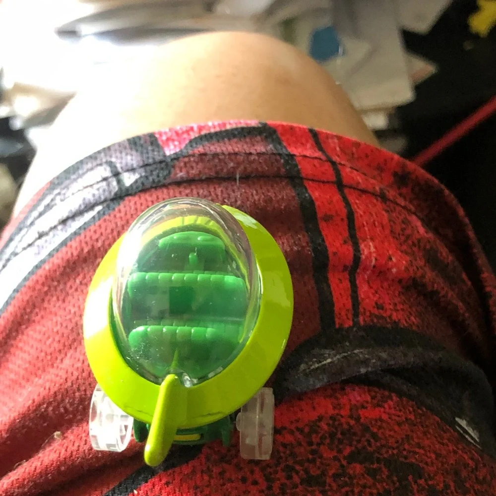 Green Electronic Wearable Tracker - Compact Clip-On